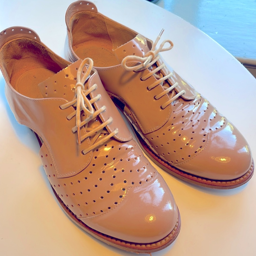 The office of Angela Scott, gently used nude patent leather Oxfords sz 38.5.